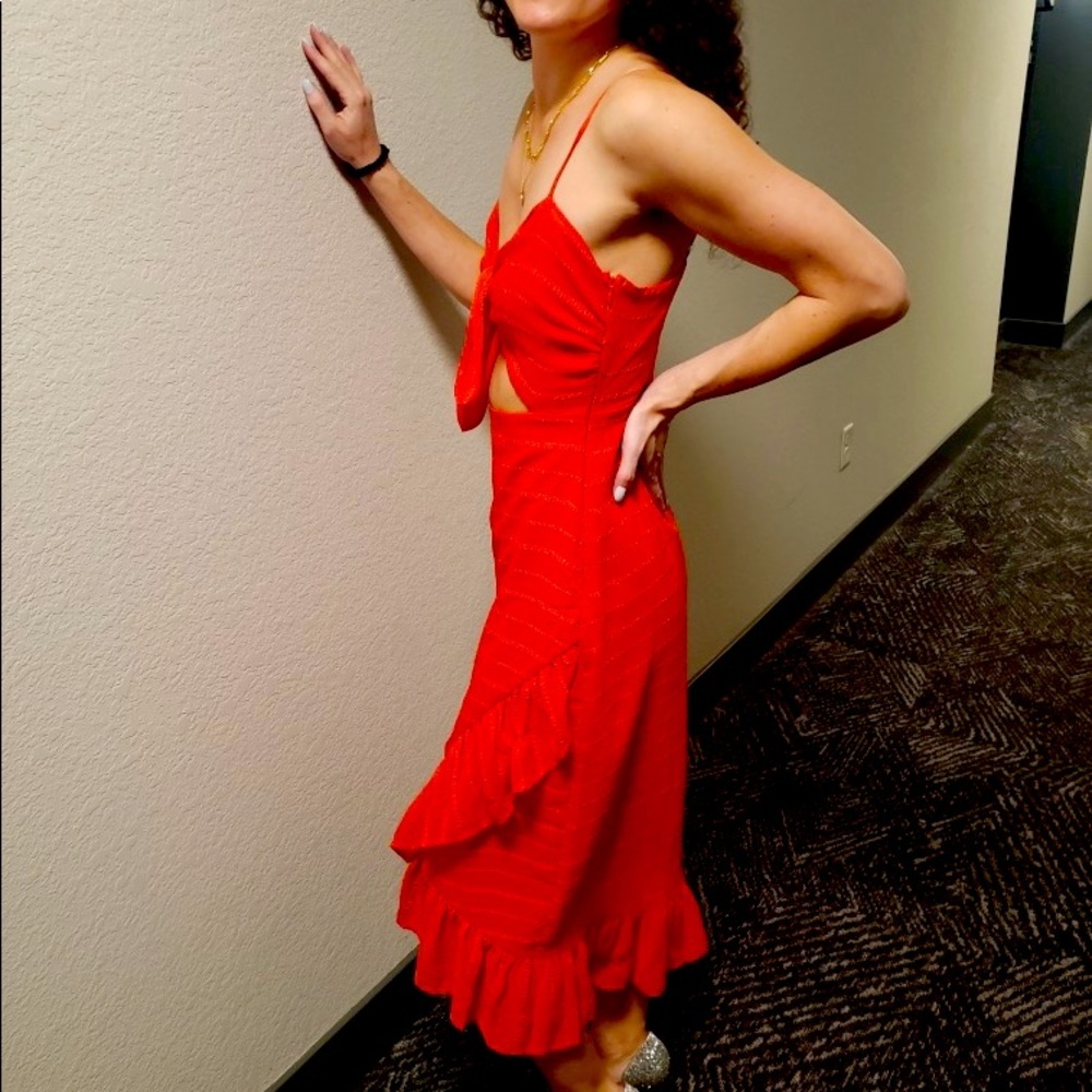 This Privacy Please Red dress sold by Revolve is the perfect dress for a wedding